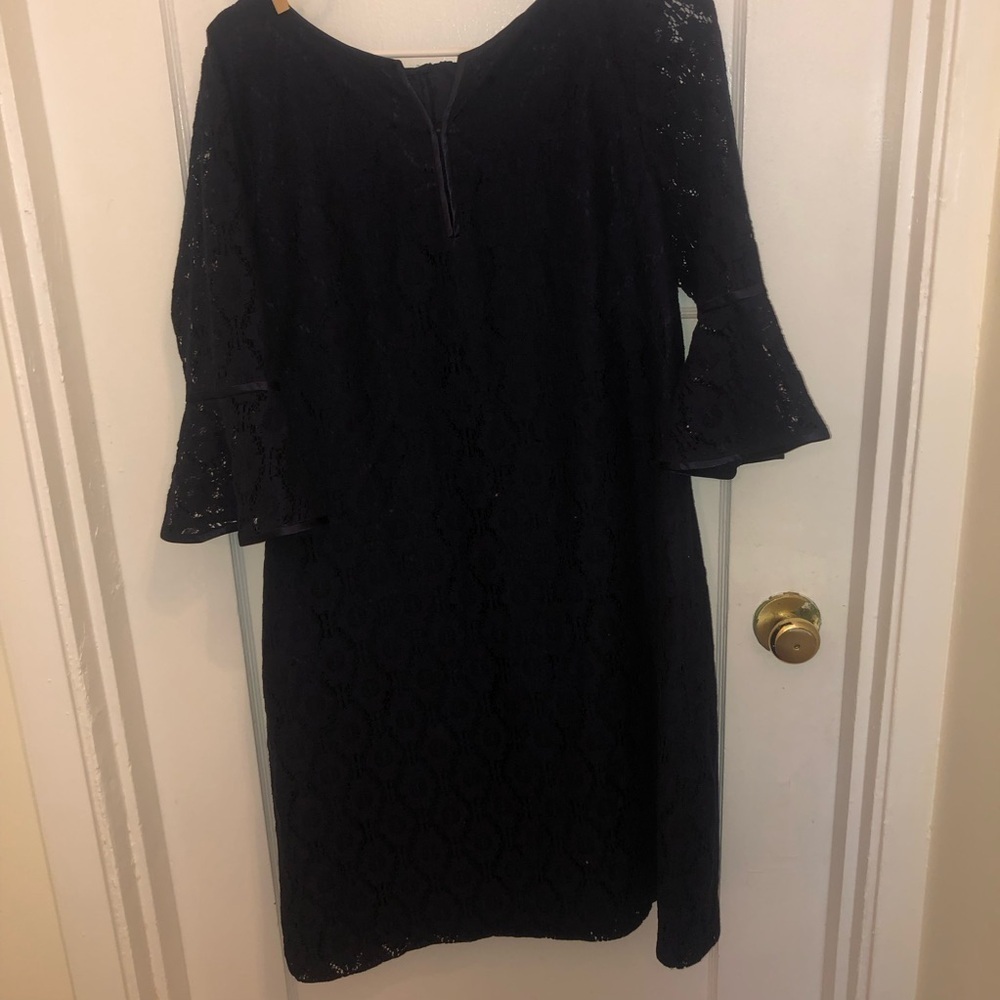 Elegant dark blue Lace Dress by Adrienne Papell . Classic dress with bell sleeve